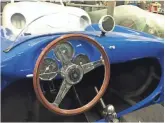  ?? MARCO DELLA CAVA, USA TODAY ?? Seduction Motorsport­s’ tribute to the 550 Spyder includes period-correct touches such as a wooden Nardi steering wheel and a circular rear mirror.