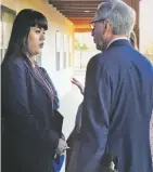  ?? DANIEL J. CHACÓN/THE NEW MEXICAN ?? From left, Jennifer Marley and her attorney, Dan Cron, speak Wednesday outside Santa Fe Magistrate Court, where the 21-year-old activist was arraigned on felony charges stemming from protests at the Fiesta de Santa Fe.