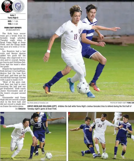  ?? Buy these photos at YumaSun.com PHOTOS BY RANDY HOEFT/YUMA SUN ?? KOFA’S NICKLAUS SULLIVAN (LEFT) Tuesday night’s game at Doan Field. dribbles the ball while Yuma High’s Joshua Gonzalez tries to defend during the first half of