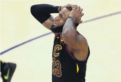  ?? BEN MARGOT/ASSOCIATED PRESS ?? Cleveland Cavaliers forward LeBron James reacts to a call during the second half of Game 1 of the NBA Finals. James scored 51 points to lead the Cavs, but the Warriors won the game in overtime, 124-114.