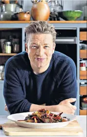  ??  ?? Fast food: Jamie Oliver conjures up a selection of quick meals