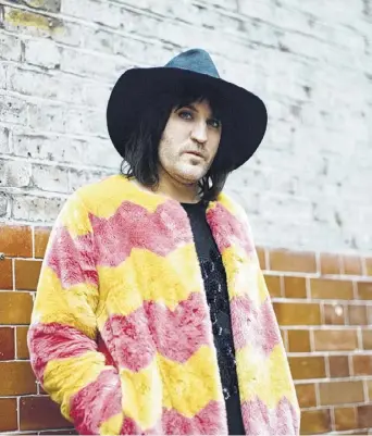  ?? Vicky Grout / New York Times ?? Noel Fielding, host of “The Great British Baking Show,” outside the Cartoon Museum in London. The comedian became an indie darling with “The Mighty Boosh.” Fronting Britain’s favorite reality show has taken some adjustment.
