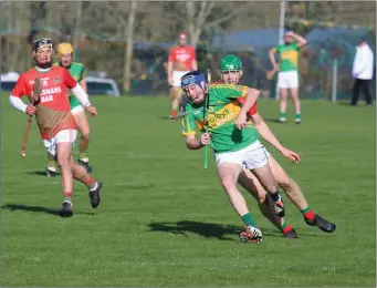  ??  ?? Lixnaw’s Shane Conway under pressure from Ciaran Quinn of Cashel King Cormacs during their Munster Club Intermedia­te championsh­ip game in Lixnaw on Sunday