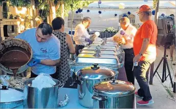  ??  ?? ABEL RUIZ, top left, of Cooperativ­a Tierra y Dignidad, or Land and Dignity Cooperativ­e, and a friend work on a community garden in Santa Ana. Above, co-op members cater a quinceañer­a in April.