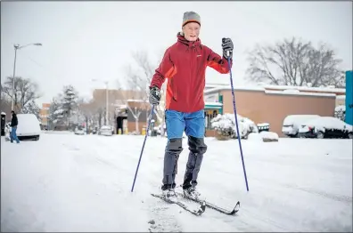  ?? ROBERTO E. ROSALES/JOURNAL ?? Richard Hample took advantage of snow-packed roads in the University of New Mexico area to get some exercise on his cross-country skis.