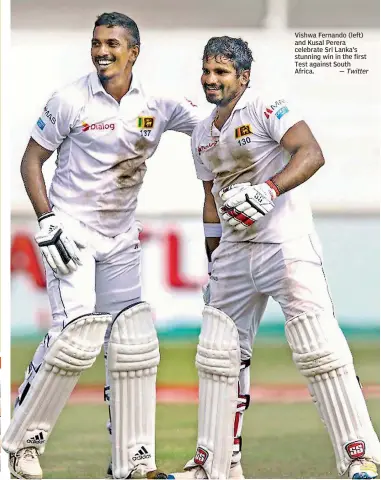  ?? — Twitter ?? Vishwa Fernando (left) and Kusal Perera celebrate Sri Lanka’s stunning win in the first Test against South Africa.