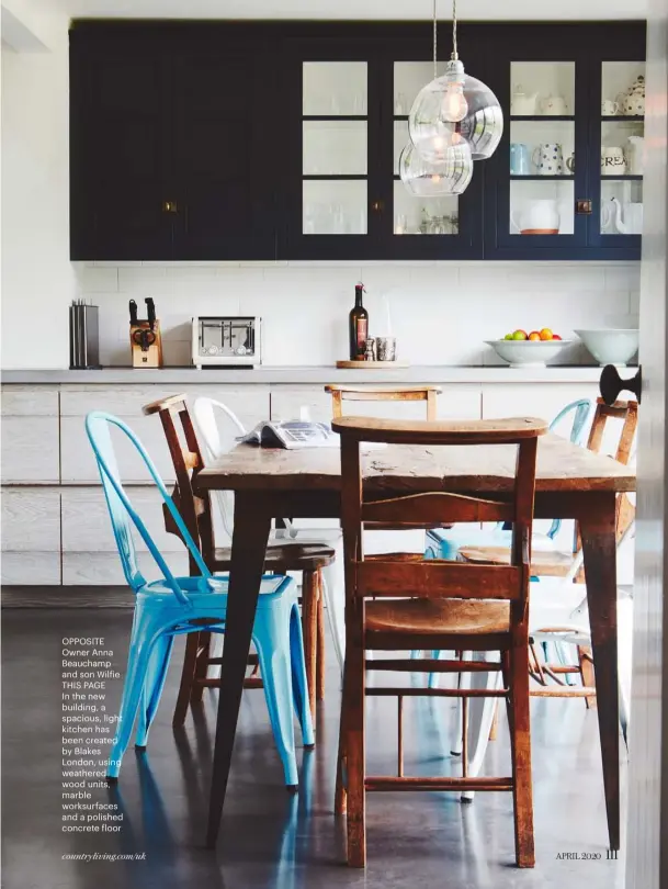  ??  ?? OPPOSITE Owner Anna Beauchamp and son Wilfie THIS PAGE In the new building, a spacious, light kitchen has been created by Blakes London, using weathered wood units, marble worksurfac­es and a polished concrete floor