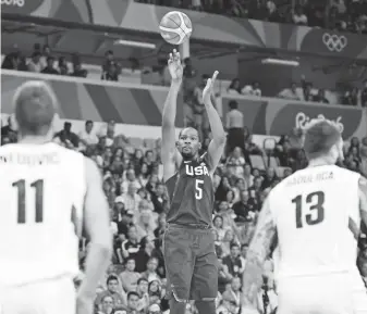  ?? BOB ROSATO, USA TODAY SPORTS ?? Kevin Durant had 30 points in the gold medal game. “Just woke up, I guess,” he says.