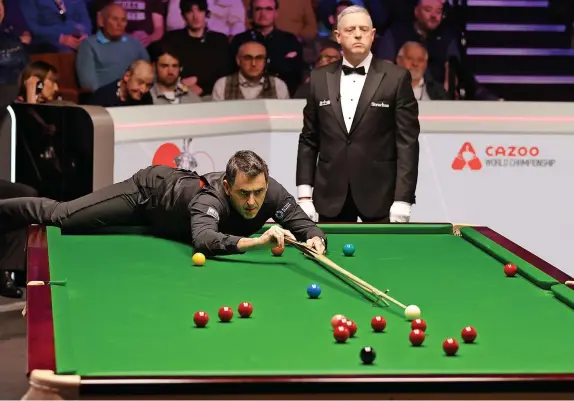  ?? George Wood/Getty Images ?? Seven-time champion Ronnie O’Sullivan moved into the last eight of the World Snooker Championsh­ip with a 13-7 win over Ryan Day