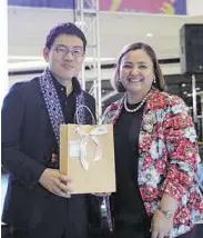  ?? ?? Atty. Lyne San Juan-Ponferrada with Suzuki’s Norihide Takei.