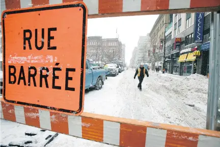  ?? JOHN MAHONEY ?? Signs of disruption along Ste-Catherine St. as three years of reconstruc­tion of the downtown artery kicked off in January. Back in 2015, merchants gave thenmayor Denis Coderre’s plan cautious approval. Now they nervously await Mayor Valérie Plante’s vision.