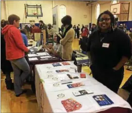  ?? KATHLEEN CAREY – DIGITAL FIRST MEDIA ?? Jacquona Blackwell is ready to sign up CASA Youth Advocate volunteers during Saturday’s Activist Fair at Media Providence School. Friends