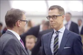  ?? FOTO: MARTTI KAINULAINE­N ?? BRöDER. Statsminis­ter Juha Sipilä hade svårt med statsskuld­en, finansmini­ster Alexander Stubb med procenträk­ning. Båda talar nedsättand­e om forskare.