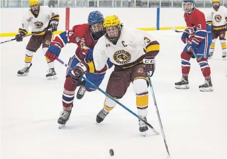  ?? JULIE JOCSAK TORSTAR ?? The Thorold Blackhawks, wearing the white uniforms, host the Welland Jr. Canadians in a “home” game at Vale Centre in Port Colborne. The team hopes to renew a Highway 58 rivalry with Welland now that it is staying in Port Colborne.