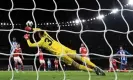  ?? Glyn Kirk/AFP/Getty Images ?? Kaoru Mitoma (right) scores Brighton’s second goal at the Emirates. Photograph: