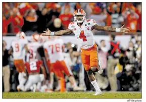  ?? AP file photo ?? Clemson quarterbac­k Deshaun Watson celebrates after throwing the game-winning touchdown pass to Hunter Renfrow that gave the Tigers a 35-31 victory over Alabama and their first national championsh­ip since 1981.