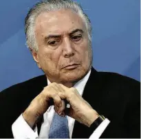  ?? Mateus Bonomi - 21.dez.2017/Folhapress ?? Michel Temer decidiu afastar 4 vice-presidente­s da Caixa sob recomendaç­ão do BC e do Ministério Público