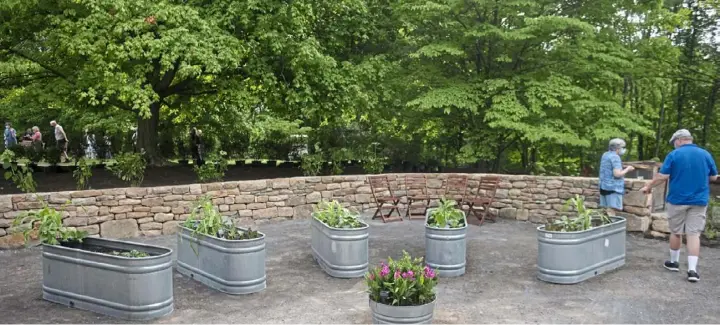  ?? Pittsburgh Post-Gazette ?? Troughs hold edible and fragrant plants in the Sniff and Savor area of the new Garden of the Five Senses at the Pittsburgh Botanic Garden in North Fayette and Collier.