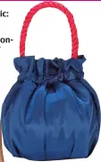  ??  ?? Satin bag, £210 Staud at mytheresa.com