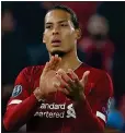  ??  ?? ROCK SOLID: Liverpool central defender Virgil van Dijk