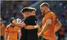  ?? Photograph: Daniel Carson/AAP ?? All Blacks Beauden Barrett and Will Jordan embrace during New Zealand’s win over Australia in Perth.