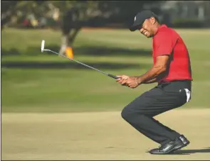  ?? The Associated Press ?? BAY HILL: Tiger Woods grimaces after missing a putt on the 15th green during the final round of the Arnold Palmer Invitation­al golf tournament Sunday in Orlando, Fla. Up next for Woods is the Masters at Augusta National.