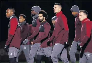  ??  ?? CLÁSICO. Los jugadores del Liverpool se preparan para el partido ante el Arsenal.