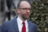  ?? EVAN VUCCI — THE ASSOCIATED PRESS ?? Acting OMB Director Russ Vought walks toward reporters Monday after an interview at the White House.