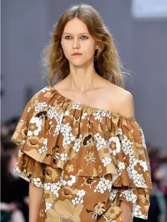  ?? (Getty) ?? At Chloe, 70s sepia-toned florals came larger than life