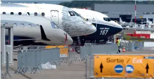  ?? AFP ?? Jetliners stand in Le Bourget prior to the opening of the Internatio­nal Paris Air Show on Monday. Boeing and Airbus are the main focus, but they would have to fend off rising competitio­n. —