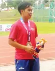  ??  ?? JI Fedalliah wins silver in the women’s long jump.