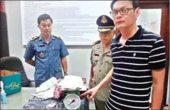  ?? STRINGER ?? A Philippine national is arrested at the Siem Reap airport in 2016 after he allegedly attempted to smuggle cocaine in shampoo bottles.