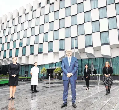  ??  ?? Back in business:
Marker Hotel staff ahead of its reopening, (L-R) Sandra Murphy, Gareth Mullins, general manager Charlie Sheil, Lisa Ferrick, and Sheila O’Sullivan