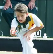  ??  ?? Warragul’s Fletcher Pallot bowls in division six on Saturday.