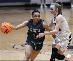  ?? (Special to the NWA Democrat-Gazette/Brian Sanderford) ?? Morrilton’s Cheyanne Kemp (left) drives to the basket as Pea Ridge’s Blakelee Winn defends during Saturday’s 4A North girls championsh­ip game in Ozark. Kemp was fouled on the play and made both of her free throws to send the game into overtime. Morrilton won 46-39 in overtime.