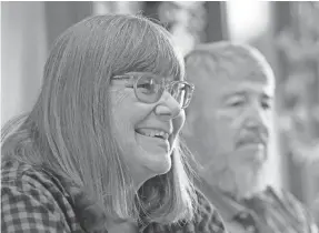  ?? JEFF LANGE/AKRON BEACON JOURNAL ?? Carol Haramis, left, smiles as she discusses the history of Heritage Farms with her husband, George, in Peninsula.