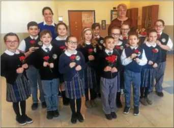  ?? PEG DEGRASSA — DIGITAL FIRST MEDIA ?? Our Lady of Angels third-grade students, left to right, Anna Folino, Logan Camp, Thomas Levesque, Farah Kabbadj, Lindsey Cathers, Michael D’Elia, Nathan Nespoli, Lucy Kirschner, Alex Oronzi, Delaney Dugan, Juliana Riberio and John Caffarella stand with...