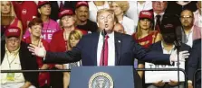  ?? Zack Wittman / Bloomberg News ?? President Donald Trump voiced his support for voter identifica­tion during a rally in Tampa, Fla., on Tuesday.