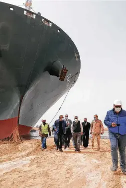  ?? Suez Canal Authority / New York Times ?? Shipowners are beginning to reroute vessels to avoid Egypt’s Suez Canal, where the Ever Given container ship ran aground Tuesday in powerful winds.