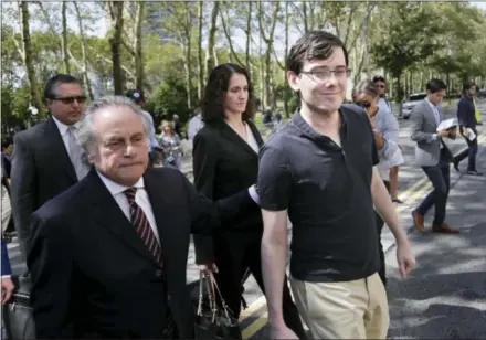  ?? SETH WENIG — THE ASSOCIATED PRESS ?? Martin Shkreli, right, and his attorney Benjamin Brafman, left, leave federal court in New York on Friday.