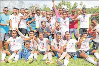  ?? Picture: FIJI FA MEDIA ?? Savusavu players and officials celebrate their win.