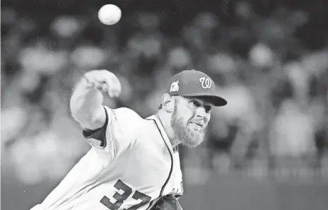  ?? GEOFF BURKE, USA TODAY SPORTS ?? Washington pitcher Stephen Strasburg says he is unavailabl­e to pitch in Game 4 against Chicago.