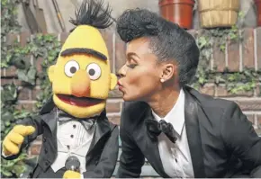  ??  ?? Janelle Monáe, who performed “Power of Yet” with the Muppet Bert.