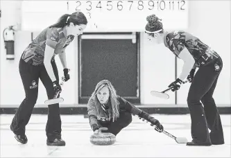  ?? JASON FRANSON THE CANADIAN PRESS ?? Skip Rachel Homan, middle, is looking to be one of Canada’s top contenders in women’s curling this season. Holman competed at the PyeongChan­g Winter Olympics in February, but didn’t make it to the podium.