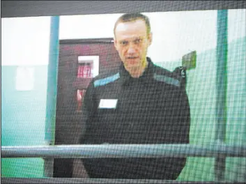 ?? Alexander Zemlianich­enko
The Associated Press ?? Russian opposition leader Alexei Navalny appears in a video link from the colony in Melekhovo, Vladimir region, during a Russian Supreme Court hearing on June 22.