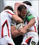  ??  ?? Hold on: Naoupu of Connacht is tackled by Ulster’s Henry and van der Merwe (right)