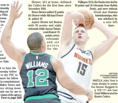  ?? MATTHEW STOCKMAN/AGENCE FRANCE-PRESSE ?? NIKOlA Jokic fires a triple double to power the Denver Nuggets to a 123-111 win over Grant Williams and the Boston Celtics.