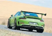  ??  ?? The most purist of Porsche's road cars, the GT3 RS is an intense driving experience. Below: The GT3 is not a subtle car, inside or out.