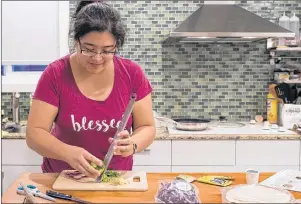  ?? CP PHOTO ?? Some of the contents of a Hello Fresh cajun fish tacos meal kit are displayed by Jayne Zhou before preparing it at her home in Vancouver, B.C., on Wednesday December 6, 2017. Home-delivered meal kits have quickly grown into a $120-million industry in Canada, according to analysts.