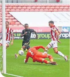  ??  ?? Stoke City’s Lee Gregory scores the only goal of the game
